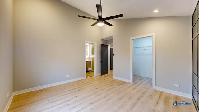 300 N Lockwood Ave, Chicago, IL 60644 - unfurnished bedroom with light wood-style flooring, a spacious closet, connected bathroom, high vaulted ceiling, and recessed lighting