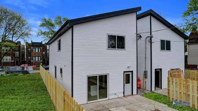300 N Lockwood Ave, Chicago, IL 60644 - back of property featuring a patio area
