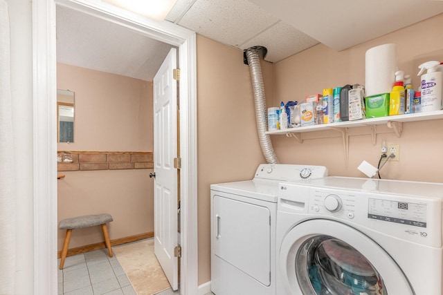 615 S 12th Ave, Saint Charles, IL 60174 - laundry area featuring washing machine and clothes dryer and light tile patterned floors
