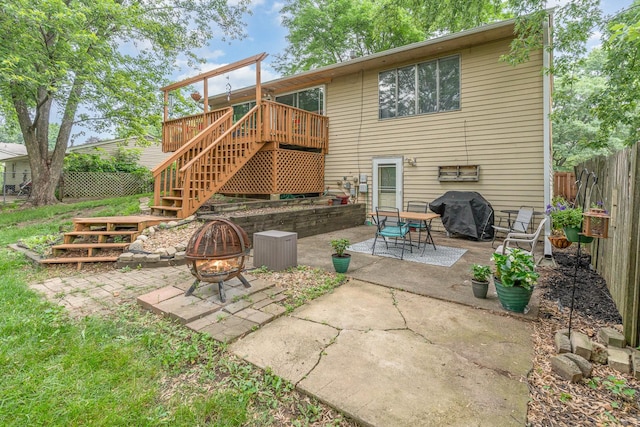 615 S 12th Ave, Saint Charles, IL 60174 - back of house featuring an outdoor fire pit, stairway, a wooden deck, and a patio area