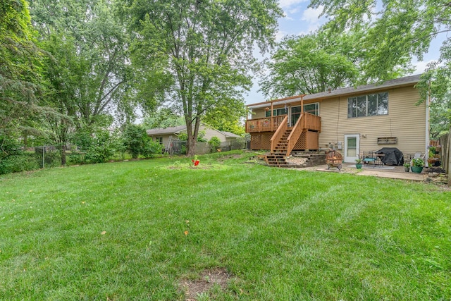 615 S 12th Ave, Saint Charles, IL 60174 - fenced backyard with stairway, a deck, and a patio