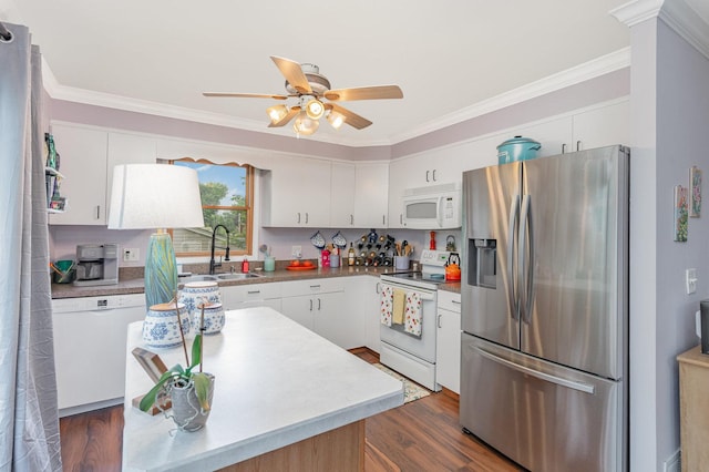 615 S 12th Ave, Saint Charles, IL 60174 - kitchen featuring white appliances, ornamental molding, white cabinetry, ceiling fan, and dark wood-type flooring