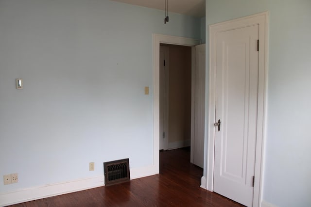 316 Marguerite St, Elgin, IL 60123 - spare room with dark wood-type flooring and baseboards