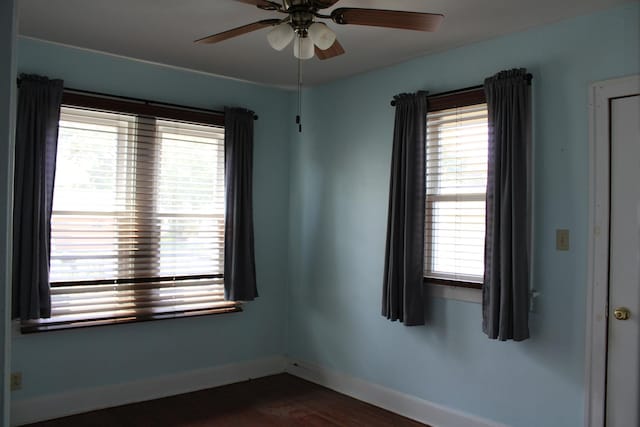 316 Marguerite St, Elgin, IL 60123 - empty room with a ceiling fan, plenty of natural light, and dark wood-style floors