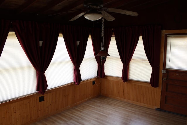316 Marguerite St, Elgin, IL 60123 - unfurnished room featuring a ceiling fan, wood finished floors, and wooden walls
