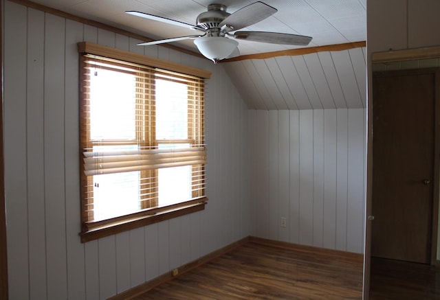 316 Marguerite St, Elgin, IL 60123 - additional living space with wood finished floors, a ceiling fan, vaulted ceiling, and wooden walls