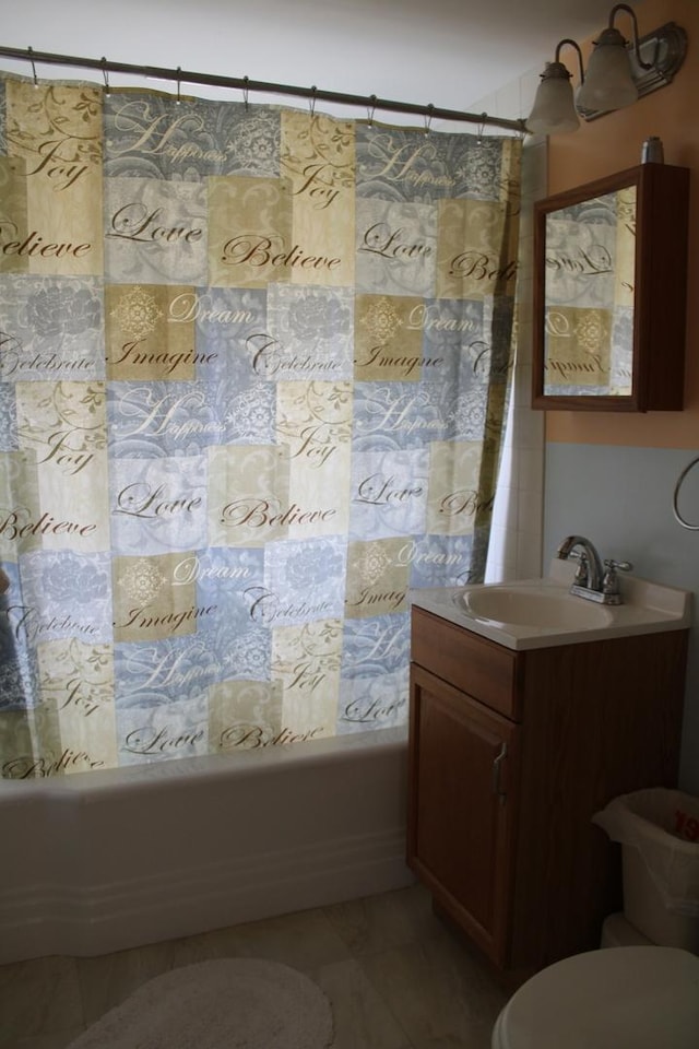 316 Marguerite St, Elgin, IL 60123 - bathroom with shower / bath combo, vanity, and marble finish flooring