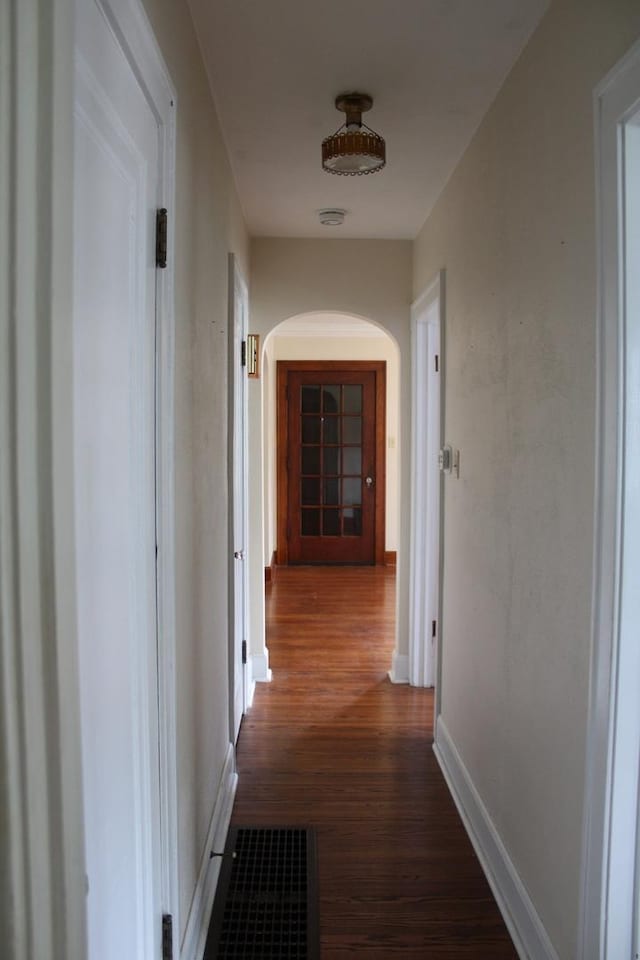 316 Marguerite St, Elgin, IL 60123 - corridor featuring arched walkways and dark wood-type flooring