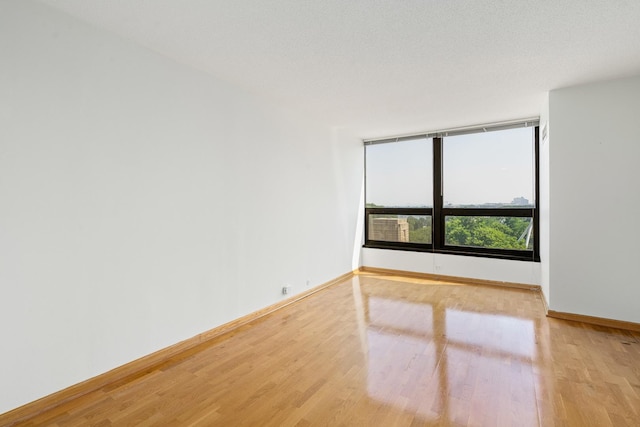 360 E Randolph St Unit 503, Chicago, IL 60601 - spare room with light wood finished floors