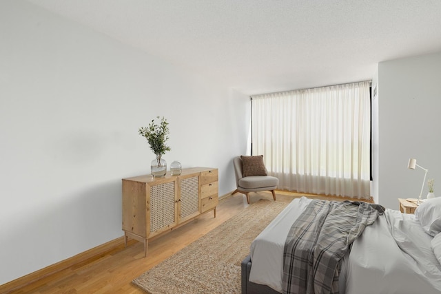 360 E Randolph St Unit 503, Chicago, IL 60601 - bedroom featuring wood finished floors and baseboards