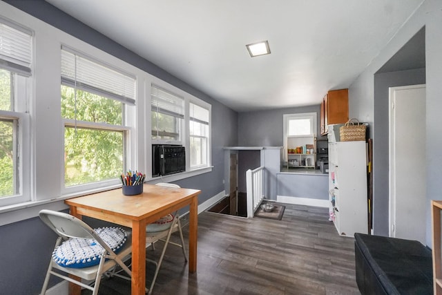208 Frank Ave, Joliet, IL 60435 - dining room featuring dark wood-style floors and baseboards