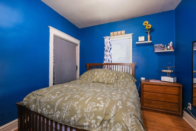 208 Frank Ave, Joliet, IL 60435 - bedroom featuring wood finished floors and baseboards