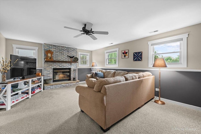 2519 Penn Blvd, Lindenhurst, IL 60046 - carpeted living room with ceiling fan and a brick fireplace