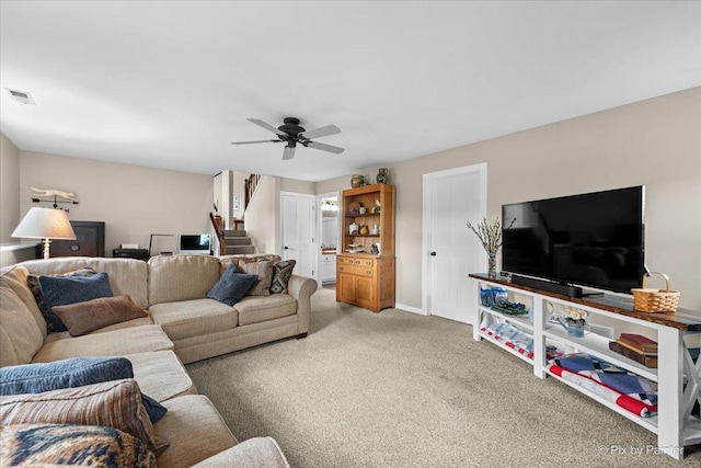 2519 Penn Blvd, Lindenhurst, IL 60046 - carpeted living area with stairs and ceiling fan