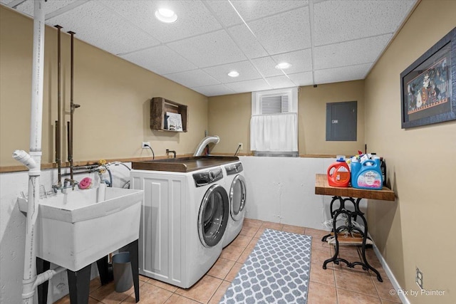 2519 Penn Blvd, Lindenhurst, IL 60046 - laundry room with electric panel, separate washer and dryer, light tile patterned floors, and recessed lighting
