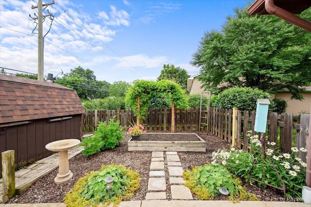 2519 Penn Blvd, Lindenhurst, IL 60046 - fenced backyard featuring a garden and a storage unit
