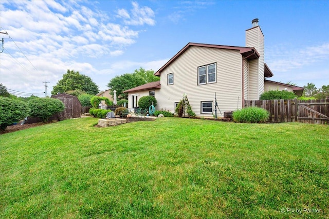 2519 Penn Blvd, Lindenhurst, IL 60046 - back of property with a chimney