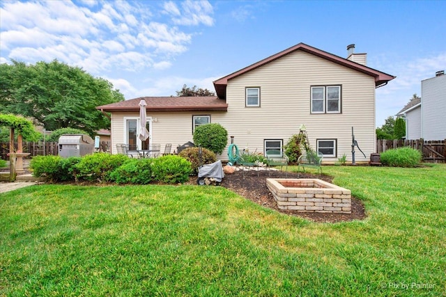 2519 Penn Blvd, Lindenhurst, IL 60046 - rear view of property with a chimney