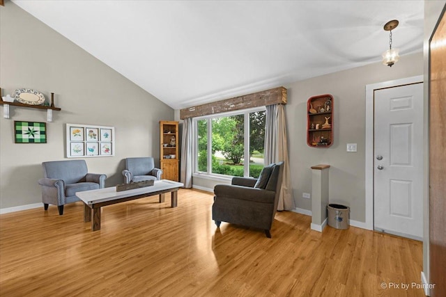 2519 Penn Blvd, Lindenhurst, IL 60046 - living area featuring light wood-style flooring and lofted ceiling