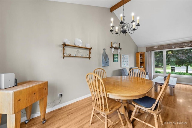 2519 Penn Blvd, Lindenhurst, IL 60046 - dining area featuring light wood-style flooring and a chandelier