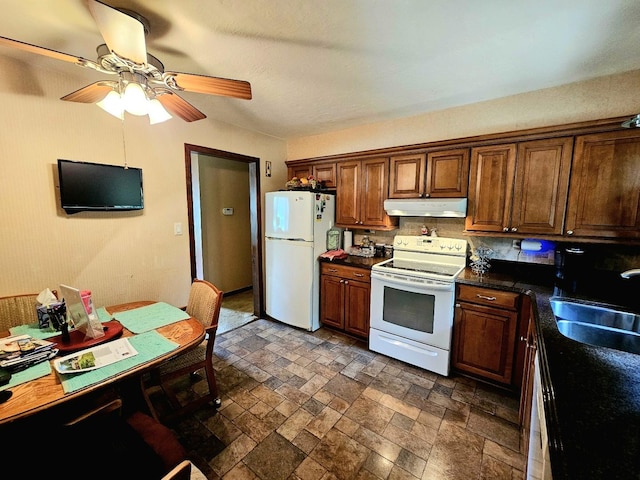 3N736 Locust Ave, West Chicago, IL 60185 - kitchen with white appliances, under cabinet range hood, stone tile floors, ceiling fan, and decorative backsplash