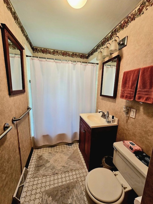 3N736 Locust Ave, West Chicago, IL 60185 - full bathroom featuring toilet and vanity