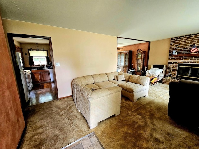 3N736 Locust Ave, West Chicago, IL 60185 - living area with carpet flooring and a brick fireplace