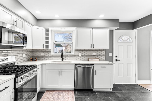 16961 Parkside Ave, South Holland, IL 60473 - kitchen featuring appliances with stainless steel finishes, plenty of natural light, white cabinetry, backsplash, and recessed lighting