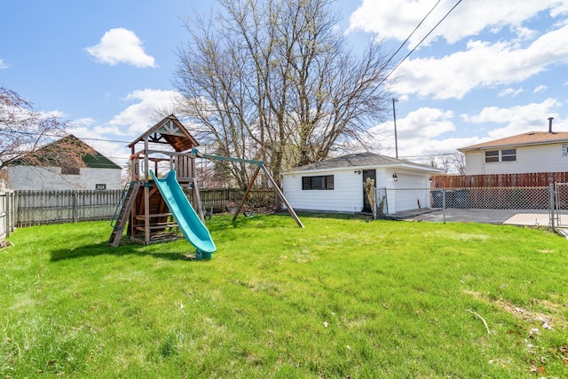 16961 Parkside Ave, South Holland, IL 60473 - fenced backyard featuring a playground and an outdoor structure