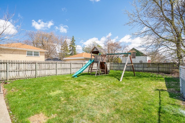 16961 Parkside Ave, South Holland, IL 60473 - fenced backyard featuring a playground
