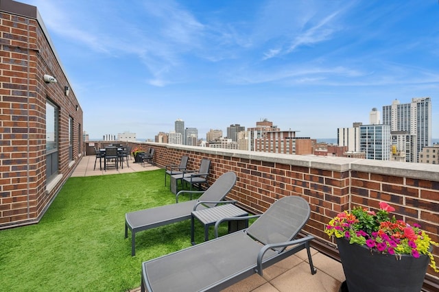 1250 N Dearborn St Unit 10B, Chicago, IL 60610 - view of patio / terrace featuring a city view