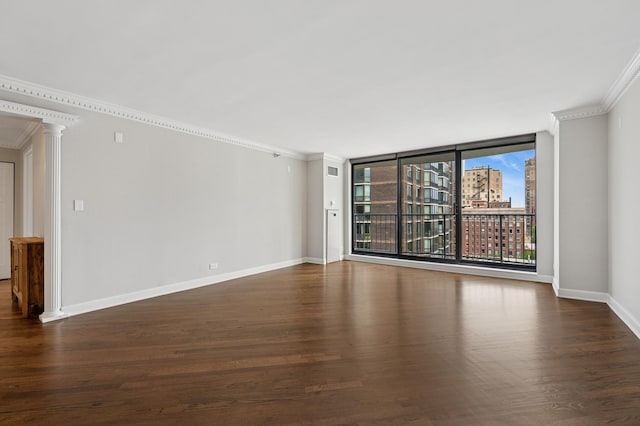 1250 N Dearborn St Unit 10B, Chicago, IL 60610 - spare room with ornamental molding, dark wood-type flooring, ornate columns, and expansive windows