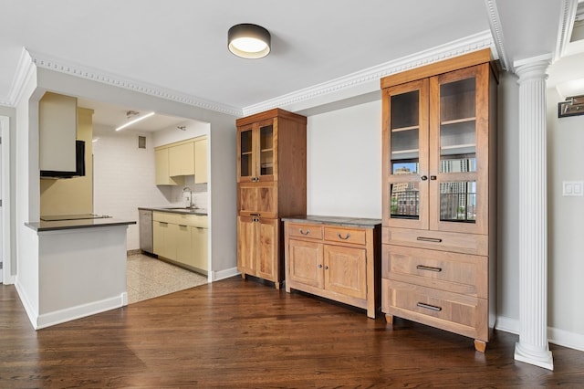1250 N Dearborn St Unit 10B, Chicago, IL 60610 - kitchen featuring decorative columns, glass insert cabinets, stainless steel dishwasher, backsplash, and crown molding
