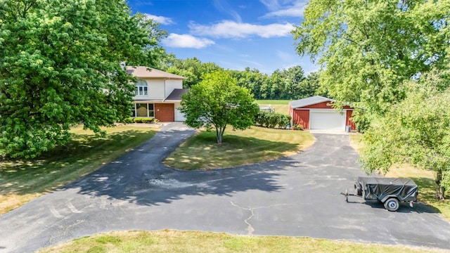 9822 W Pauling Rd, Monee, IL 60449 - obstructed view of property with an outbuilding and a detached garage