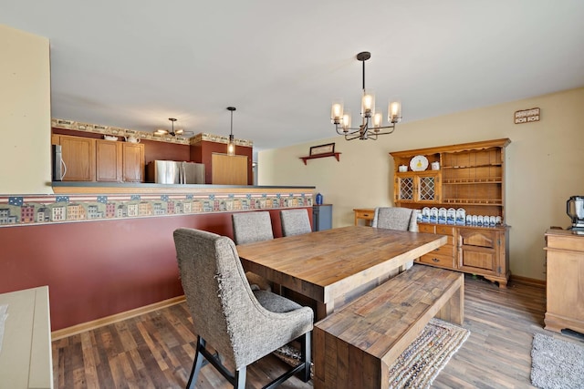 1075 Christine Ln, Antioch, IL 60002 - dining space with a chandelier and light wood-style floors