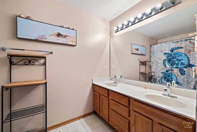 1075 Christine Ln, Antioch, IL 60002 - bathroom featuring double vanity and tile patterned floors