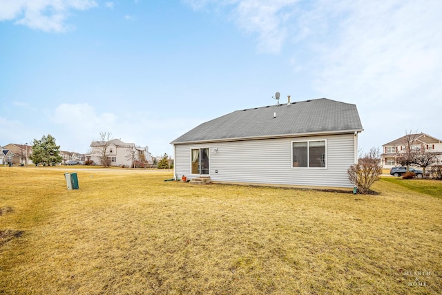 1075 Christine Ln, Antioch, IL 60002 - back of house featuring a yard