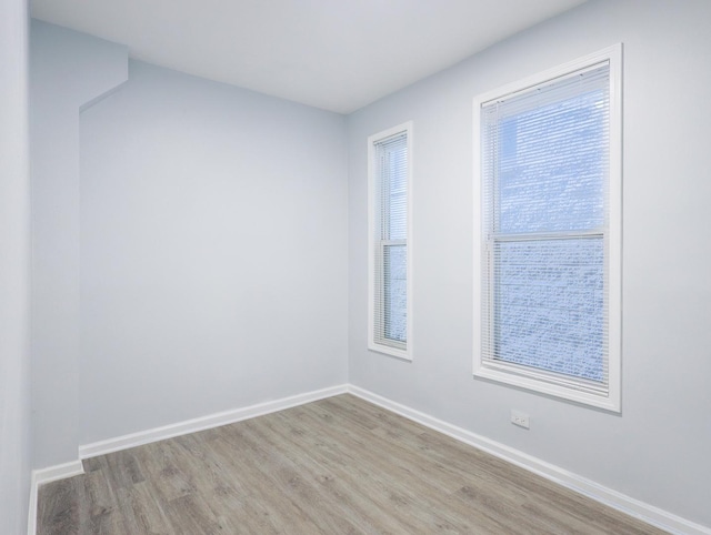 1406 N Artesian Ave, Chicago, IL 60622 - unfurnished room with wood finished floors and baseboards