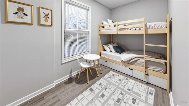 1406 N Artesian Ave, Chicago, IL 60622 - bedroom with baseboards and wood finished floors