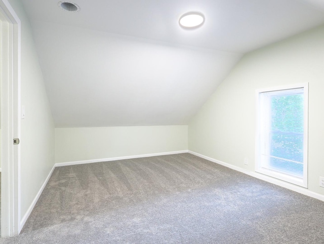 1406 N Artesian Ave, Chicago, IL 60622 - additional living space with carpet flooring and vaulted ceiling