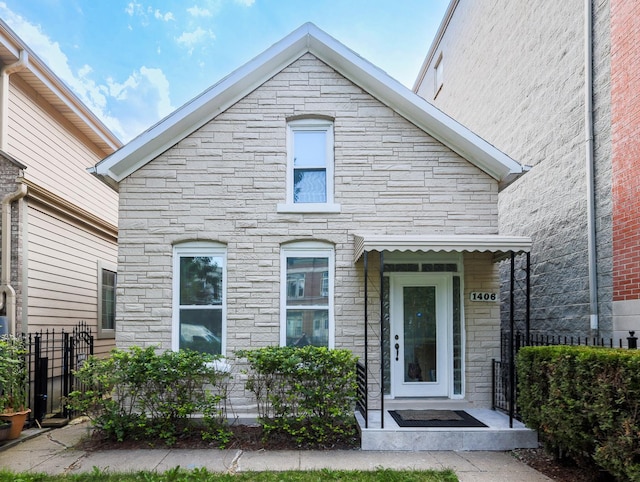 1406 N Artesian Ave, Chicago, IL 60622 - view of front of house featuring stone siding