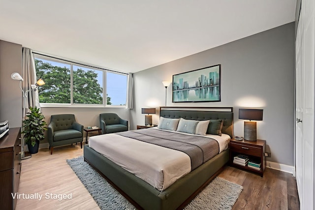 101 Bar Harbour Rd Unit 5N, Schaumburg, IL 60193 - bedroom featuring wood finished floors and baseboards