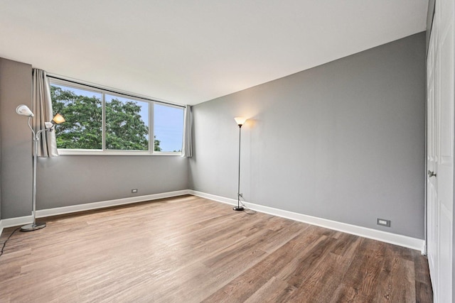 101 Bar Harbour Rd Unit 5N, Schaumburg, IL 60193 - empty room featuring wood finished floors and baseboards