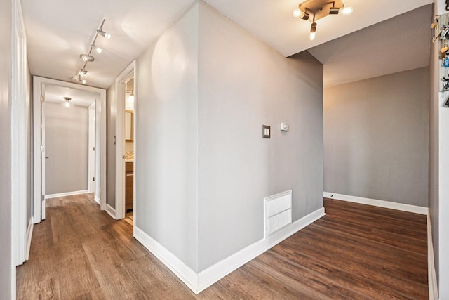 101 Bar Harbour Rd Unit 5N, Schaumburg, IL 60193 - corridor featuring rail lighting and dark wood finished floors