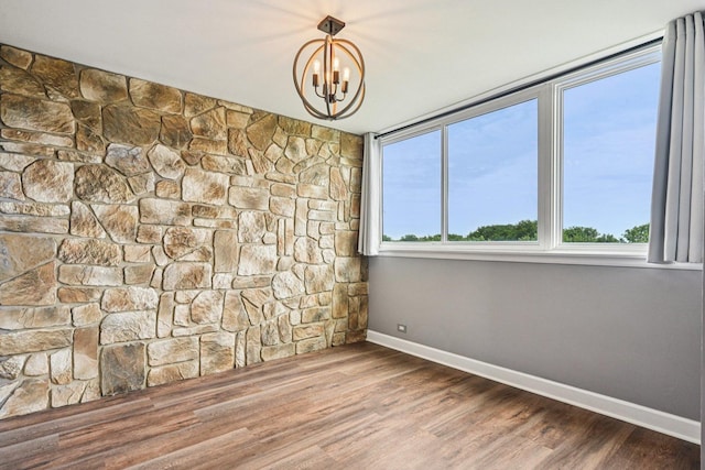 101 Bar Harbour Rd Unit 5N, Schaumburg, IL 60193 - spare room with a chandelier and wood finished floors