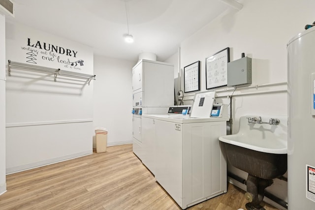 101 Bar Harbour Rd Unit 5N, Schaumburg, IL 60193 - shared laundry room featuring stacked washer and clothes dryer, light wood-style flooring, electric water heater, and independent washer and dryer