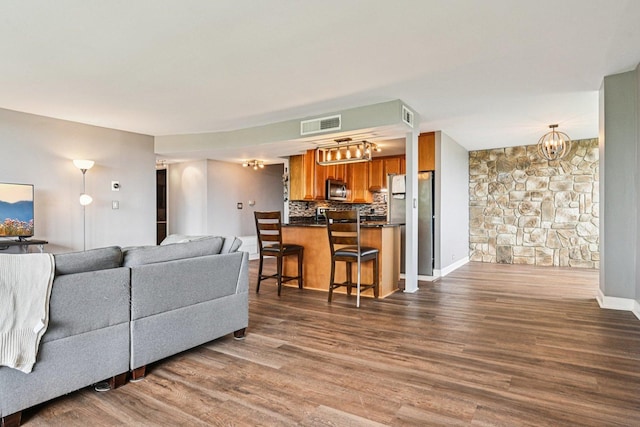 101 Bar Harbour Rd Unit 5N, Schaumburg, IL 60193 - living room with dark wood-style floors and a chandelier