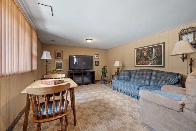 8424 Moody Ave, Burbank, IL 60459 - living room featuring wooden walls and plenty of natural light