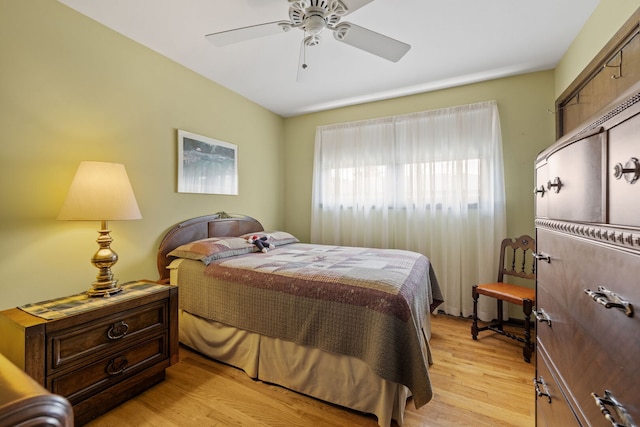8424 Moody Ave, Burbank, IL 60459 - bedroom with light wood finished floors and a ceiling fan