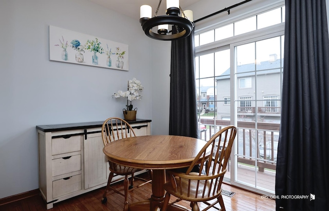 78 Thomas Ct, Grayslake, IL 60030 - dining area with healthy amount of natural light, hardwood / wood-style floors, and a chandelier